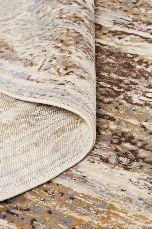 2' X 3' Tan Ivory And Brown Abstract Area Rug